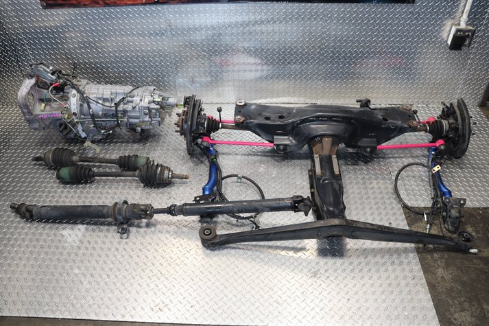 IMG_6764 JDM TY856WB2GA SUBARU IMPREZA WRX STI S202 GDB 6 SPEED MANUAL AWD TRANSMISSION W/ COMPLETE REAR SUSPENSION CROSSMEMBER - Image 1